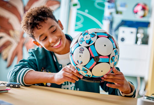 LEGO 43019 Soccer Ball is a full-size football hiding a miniature stadium inside.